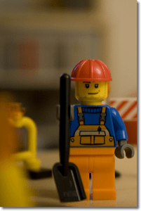 Lego Work holding a shovel.