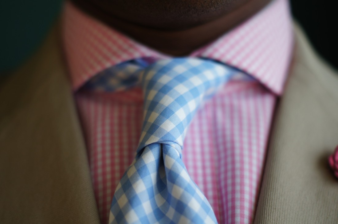 Blue gingham tie.